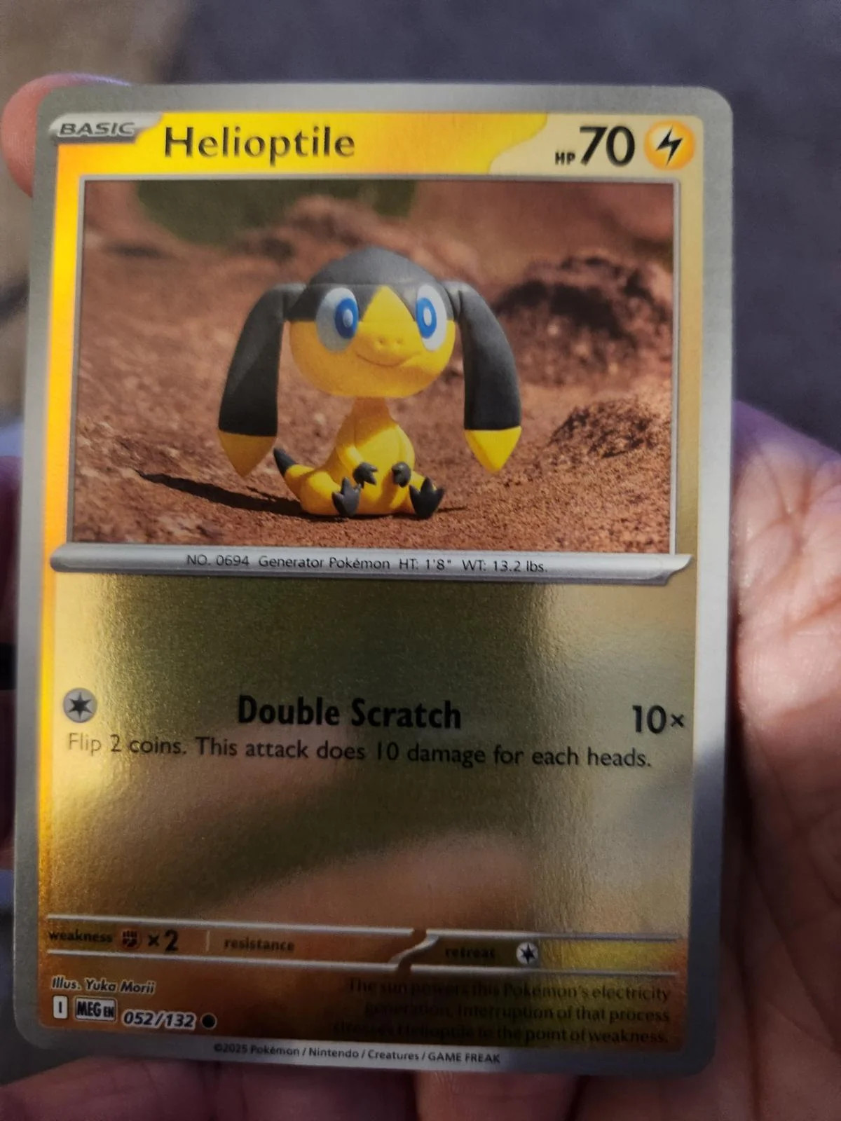 Helioptile #052 — Megaevolução (Reverse Holo)