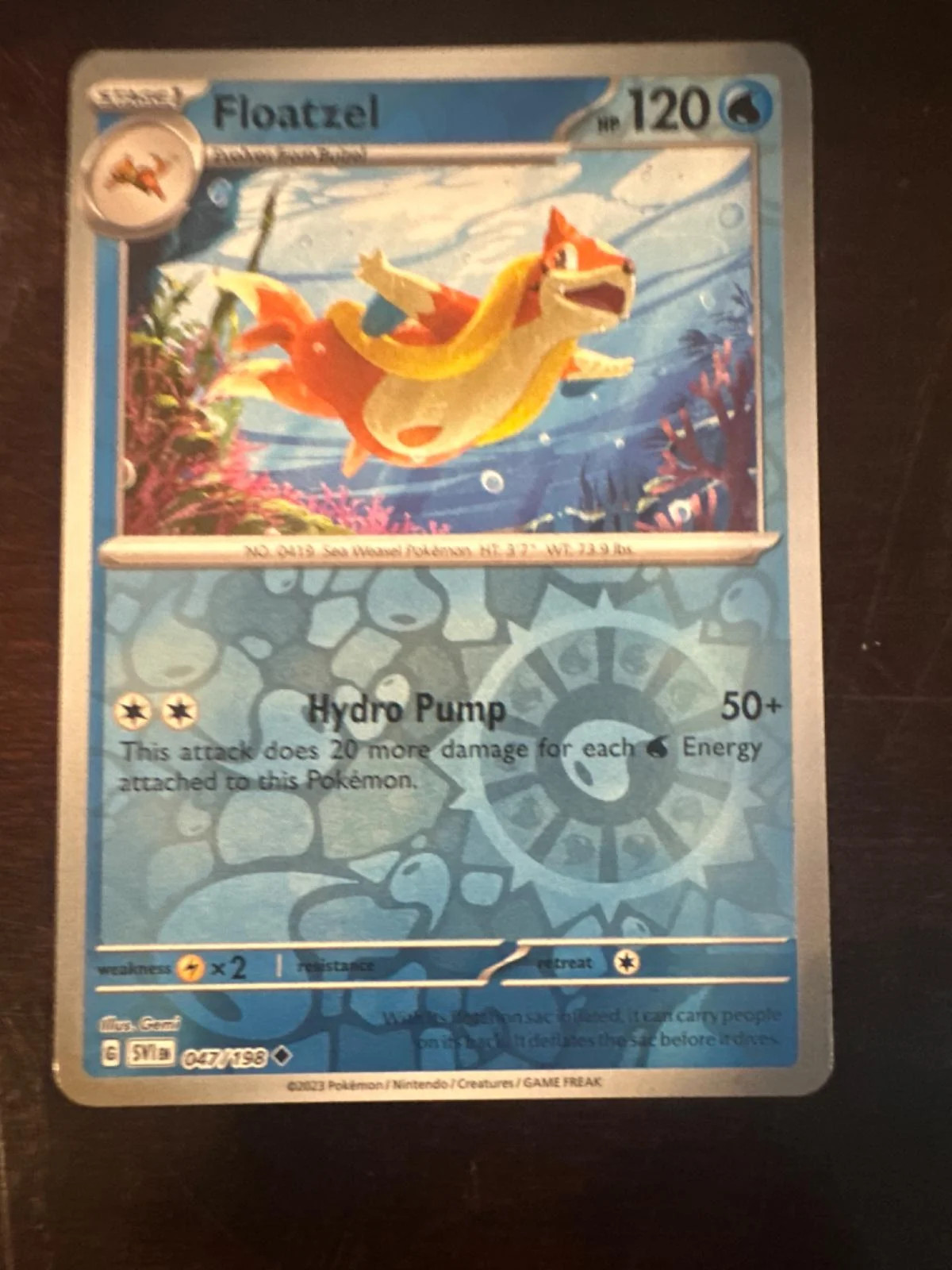Floatzel #047 — Scarlatto e Violetto (Reverse Holo)