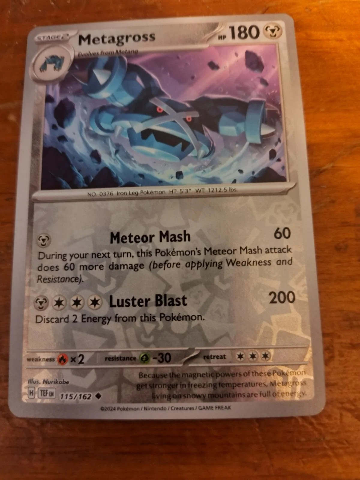 Metagross #115 — Forças Temporais (Reverse Holo)