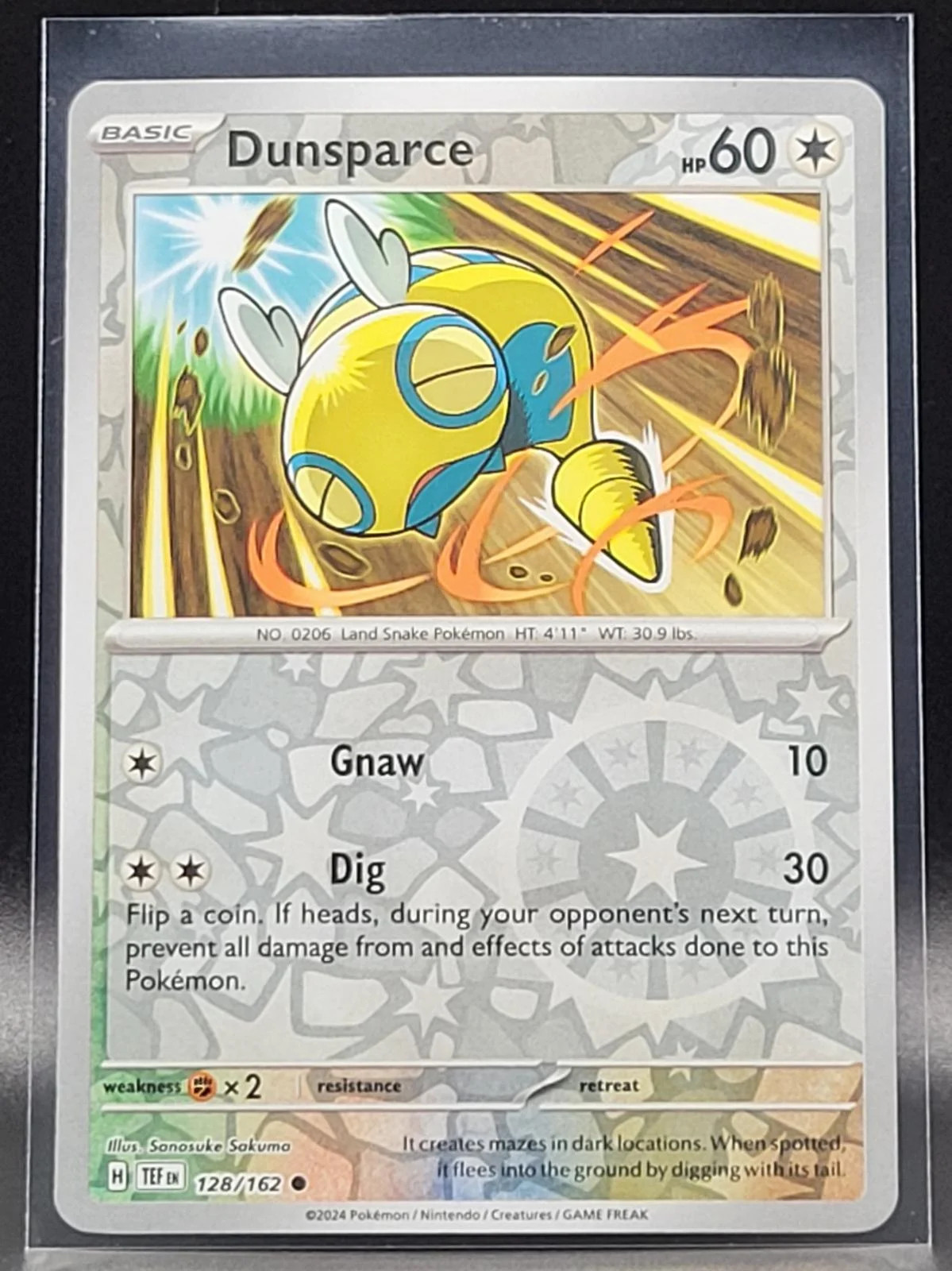 Dummisel #128 — Gewalten der Zeit (Reverse Holo)