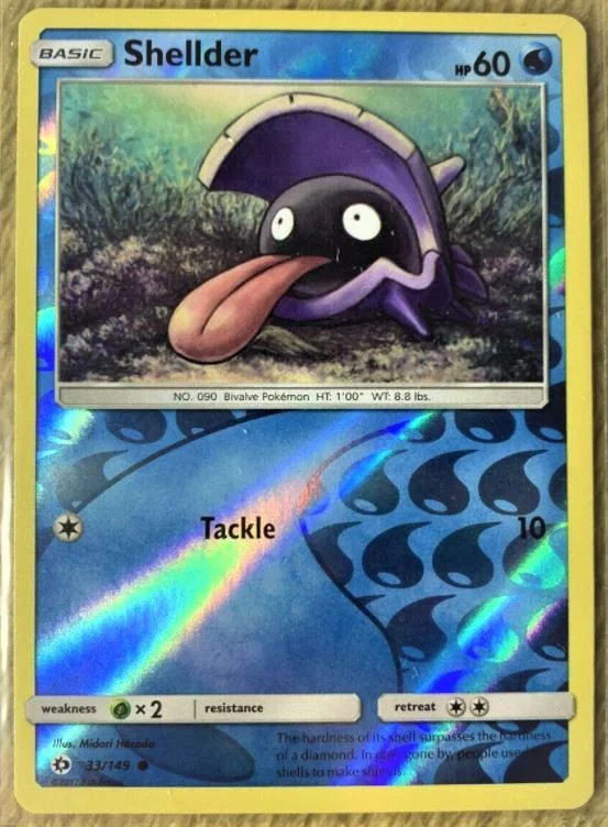 Shellder #33 — Sole e Luna (Reverse Holo)