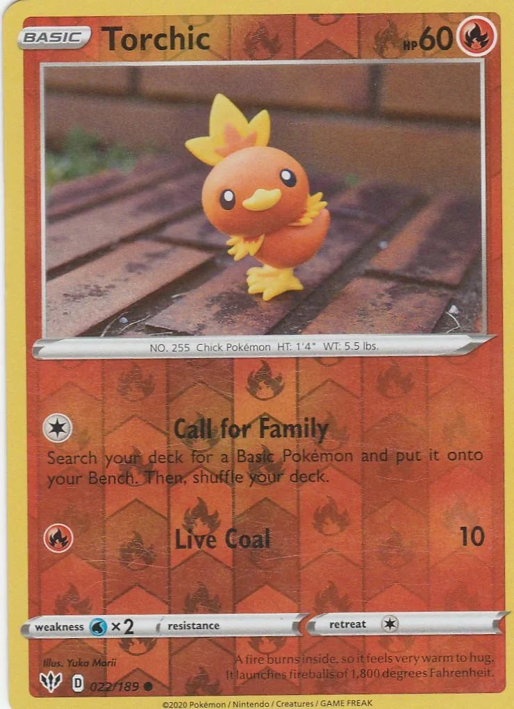 Torchic #22 — Escuridão Incandescente (Reverse Holo)