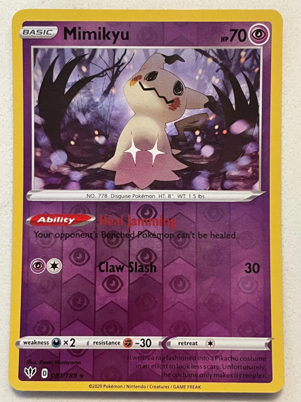 Mimikyu #81 — Escuridão Incandescente (Reverse Holo)
