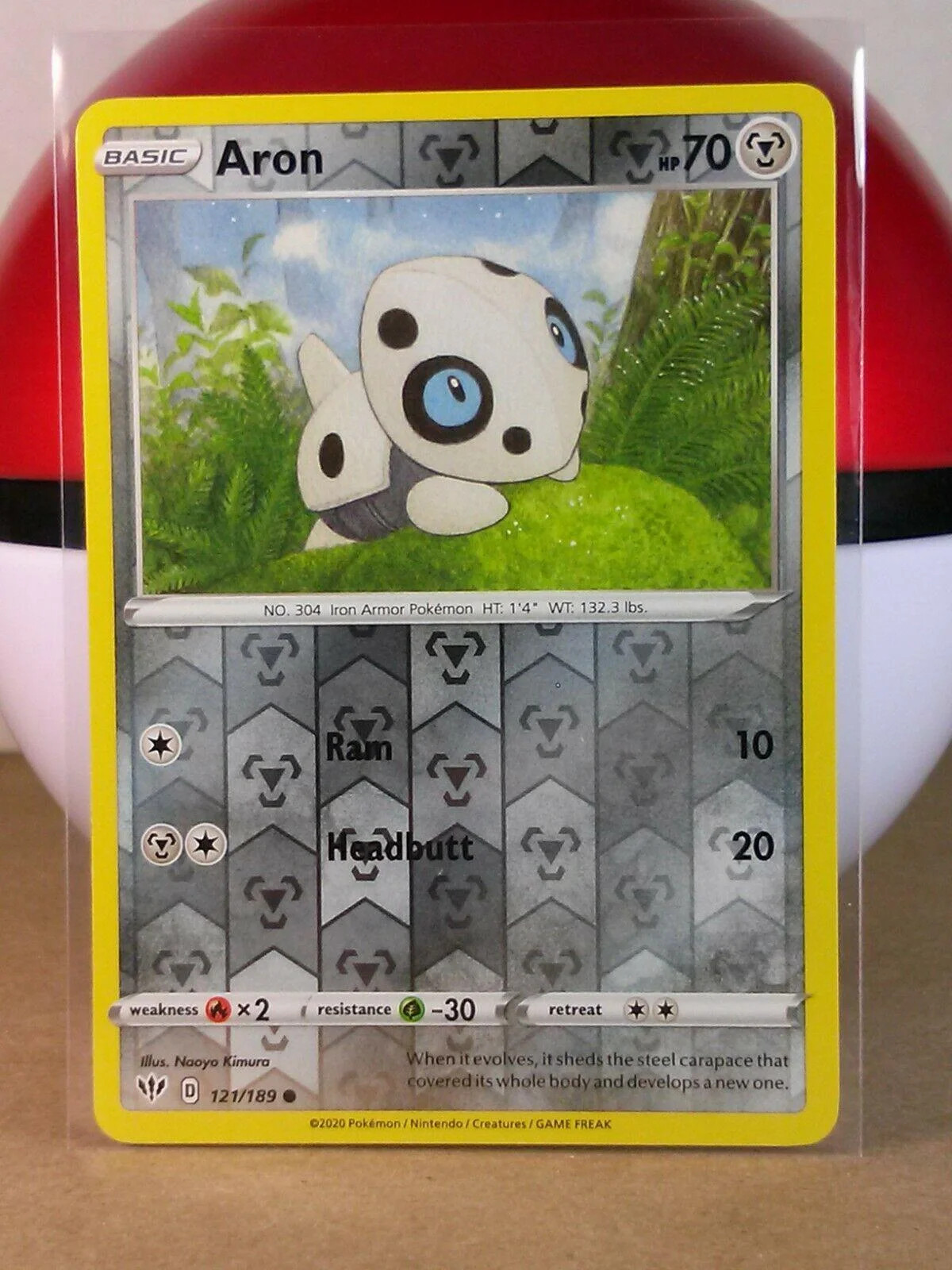 Aron #121 — Escuridão Incandescente (Reverse Holo)