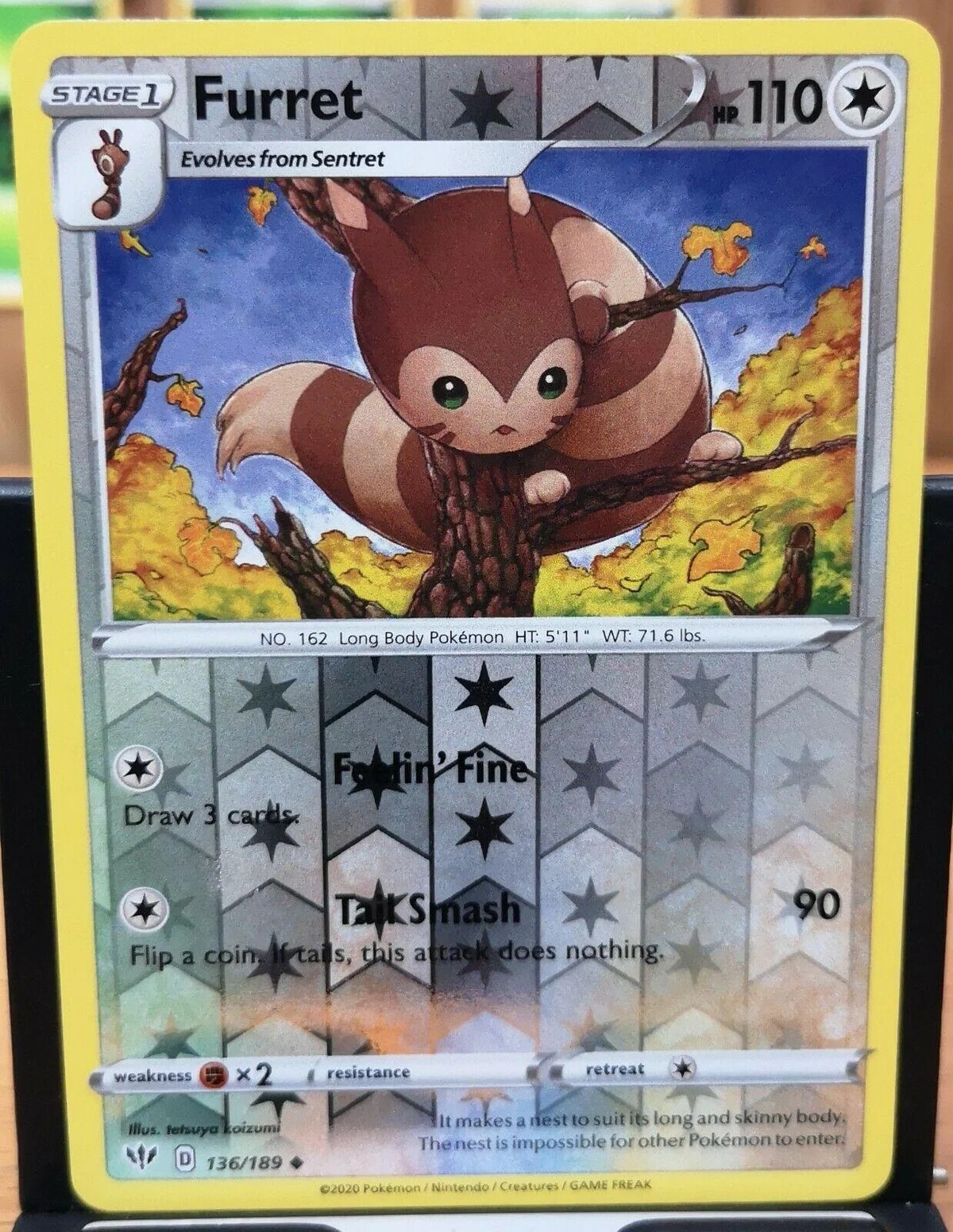 Furret #136 — Escuridão Incandescente (Reverse Holo)