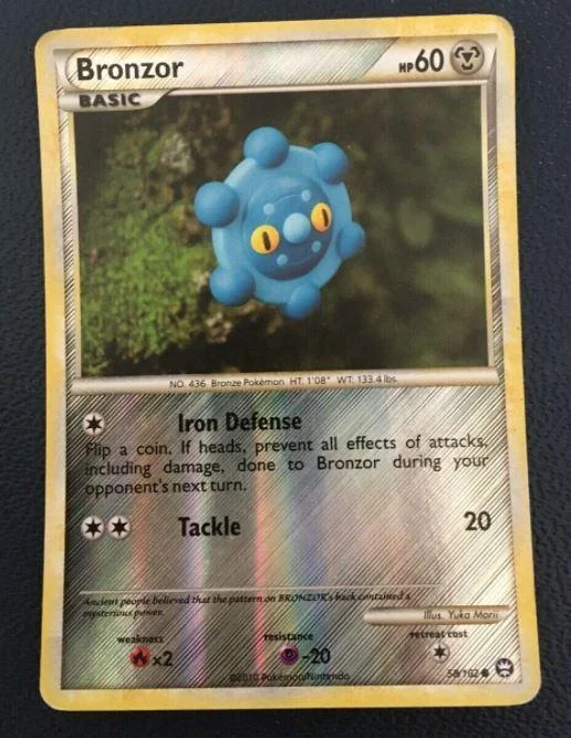 Bronzor #58 — Triumphant (Reverse Holo)