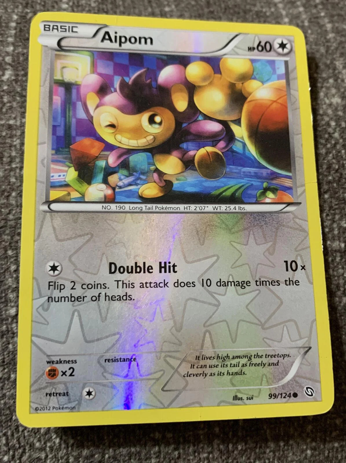 Aipom #99 — Dragones Majestuosos (Reverse Holo)