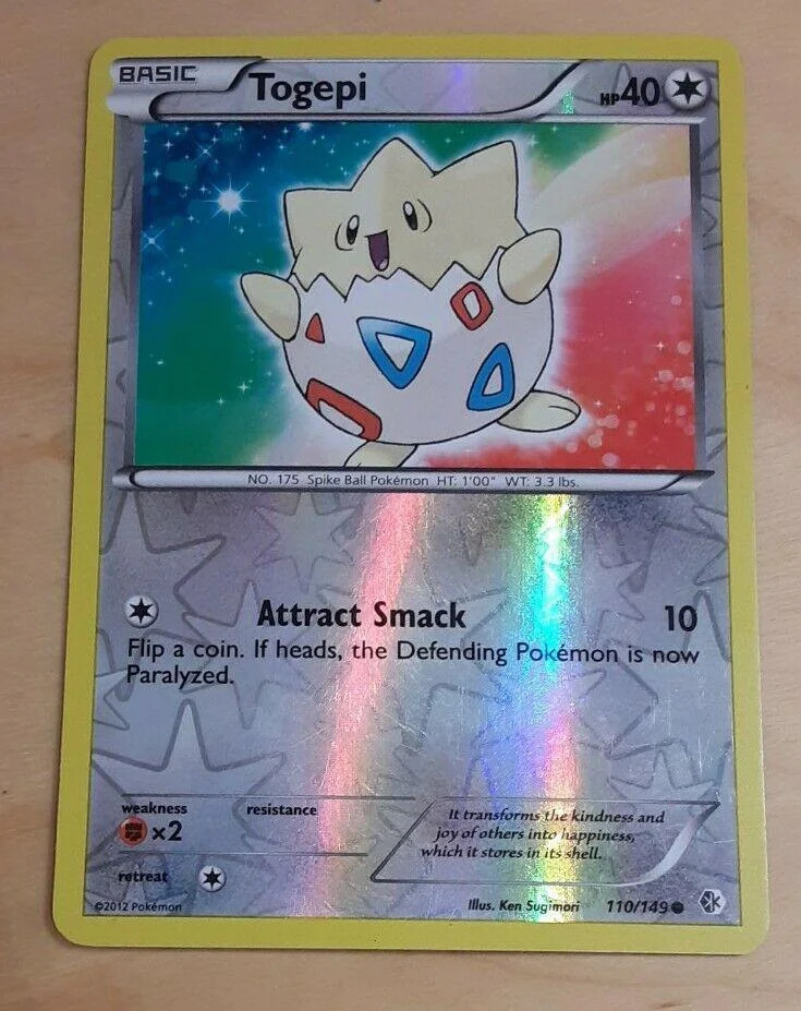 Togepi #110 — Fronteiras Cruzadas (Reverse Holo)
