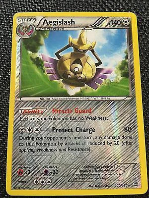 Aegislash #100 — Conflito Primitivo (Reverse Holo)